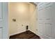 Bright laundry room with hookups and built-in shelving at 9451 Ashbury Cir # 202, Parker, CO 80134