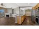 Open concept floorplan with kitchen, living room and dining area at 9451 Ashbury Cir # 202, Parker, CO 80134