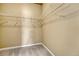 Large walk-in closet with wire shelving at 9451 Ashbury Cir # 202, Parker, CO 80134