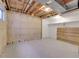 Unfinished basement with open ceiling and concrete walls, offering potential for customization at 11427 Brownstone Dr, Parker, CO 80138