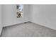 Bedroom featuring neutral carpet and a window for natural light at 11427 Brownstone Dr, Parker, CO 80138