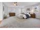 Spacious main bedroom with carpet, complemented by a ceiling fan and neutral decor at 11427 Brownstone Dr, Parker, CO 80138