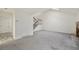 Spacious living room with stairs, and large windows at 3274 S Heather Gardens Way, Aurora, CO 80014