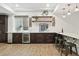 The basement bar area includes a wine fridge, storage, and bar seating at 1351 S Milwaukee St, Denver, CO 80210