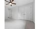 A bedroom with white walls and a ceiling fan at 1351 S Milwaukee St, Denver, CO 80210