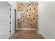 Fun indoor climbing wall with colorful holds, offering a unique and active recreation space in the home at 1351 S Milwaukee St, Denver, CO 80210