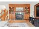 Living room featuring a fireplace with custom built-ins and black marble at 1351 S Milwaukee St, Denver, CO 80210