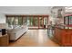 Open floorplan with living and kitchen features, large windows, and a breakfast bar at 1351 S Milwaukee St, Denver, CO 80210