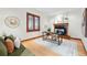 Cozy home office with a fireplace, hardwood floors, and a comfortable seating area at 1351 S Milwaukee St, Denver, CO 80210