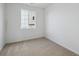 Cozy bedroom with natural light and carpeted floors at 1281 Rock Cliff Ave, Erie, CO 80516
