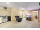 Spacious basement with room for recreation and relaxation, featuring neutral colors at 1550 Ajax St, Strasburg, CO 80136