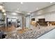 Well-equipped kitchen with stainless steel appliances, double oven, and granite countertops at 1550 Ajax St, Strasburg, CO 80136