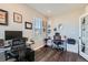 Bright office space featuring dual workstations, ergonomic chairs, and ample natural light at 2419 Flats St, Erie, CO 80516