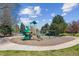 A well-equipped neighborhood playground with swings, slides, and climbing structures for recreation at 5320 S Geneva St, Englewood, CO 80111