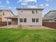 Spacious backyard with well-maintained lawn and patio, perfect for outdoor activities and relaxation at 15350 W 50Th Dr, Golden, CO 80403