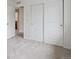 Bedroom with carpet and closet with sliding doors at 15350 W 50Th Dr, Golden, CO 80403