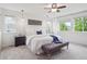 Bright primary bedroom featuring natural light, neutral tones, modern fixtures, and a comfortable layout at 15350 W 50Th Dr, Golden, CO 80403