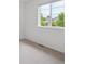 Bright bedroom with a large window offering great outdoor views and plush carpeting at 15350 W 50Th Dr, Golden, CO 80403