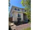 Charming two-story home with a combination of stone and siding, complemented by well-maintained landscaping and curb appeal at 15350 W 50Th Dr, Golden, CO 80403