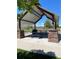 Community picnic area with a covered pavilion and seating, perfect for outdoor gatherings and enjoying the surrounding landscape at 15350 W 50Th Dr, Golden, CO 80403