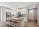 Bright kitchen with stainless steel appliances, granite countertops, and a large island at 11119 E 25Th Dr, Aurora, CO 80010