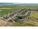 Well-planned community with a pond and lush greenery, offering a serene environment at 2746 Stallion Way, Mead, CO 80542