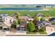 Residential neighborhood with well-maintained homes and green lawns, nearby lake at 2746 Stallion Way, Mead, CO 80542