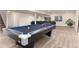 Finished basement featuring a pool table, television, and a comfortable seating area at 2746 Stallion Way, Mead, CO 80542