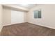 Bedroom with a window and closet that allows ample natural light and storage at 2746 Stallion Way, Mead, CO 80542