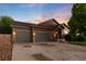 Home exterior showcasing a three-car garage, well-maintained lawn, and inviting front entrance at 2746 Stallion Way, Mead, CO 80542