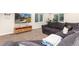 Basement living area featuring a large screen television and a comfortable sofa at 2746 Stallion Way, Mead, CO 80542