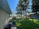 This backyard showcases lush green space and mature trees, offering a serene outdoor setting at 6552 S Pearl St, Centennial, CO 80121
