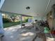 Covered patio with furniture and view of backyard at 6552 S Pearl St, Centennial, CO 80121