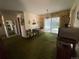 Dining room features a sliding glass door and adjacent patio view at 6552 S Pearl St, Centennial, CO 80121