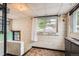 Finished basement area with painted block walls, neutral colors, and a window at 4001 Kalamath St, Denver, CO 80211