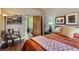 Charming bedroom with hardwood flooring, comfortable seating, and ample natural light at 4001 Kalamath St, Denver, CO 80211