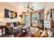Inviting living room featuring wood floors, fireplace, and natural light at 4001 Kalamath St, Denver, CO 80211