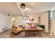 Inviting living room with stylish decor, a comfortable seating area, and unique lighting fixtures at 4001 Kalamath St, Denver, CO 80211