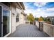 A well-maintained wood deck with stone pillars offering outdoor space at 6276 S Robertsdale Ct, Aurora, CO 80016