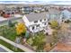 Aerial view of a large home with a well-maintained backyard and mature trees at 6276 S Robertsdale Ct, Aurora, CO 80016
