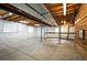 Bright, unfinished basement with open layout and visible utilities at 6276 S Robertsdale Ct, Aurora, CO 80016