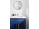 Bathroom featuring a blue vanity and modern fixtures at 3801 S Albion St, Englewood, CO 80113