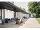 Covered patio with comfortable seating and stylish decor at 3801 S Albion St, Englewood, CO 80113