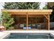 Covered poolside lounge area with comfortable seating at 3801 S Albion St, Englewood, CO 80113