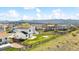 Spacious backyard featuring well-kept lawn, wooden fence, and patio at 9665 Bighorn Way, Littleton, CO 80125