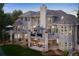 A multi-level outdoor living space with a patio and balcony perfect for entertaining and relaxation at 11362 W Baltic Ct, Lakewood, CO 80227