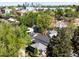 Scenic aerial view of the neighborhood with the city skyline in the distance at 3842 Zenobia St, Denver, CO 80212