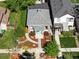 Aerial view of the home showcasing the landscaped yard and neighborhood at 3842 Zenobia St, Denver, CO 80212