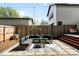 Relaxing backyard with stylish furniture, string lights, and modern fence at 3842 Zenobia St, Denver, CO 80212