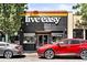 Tattoo parlor has modern storefront with eye-catching signage and street view at 3842 Zenobia St, Denver, CO 80212
